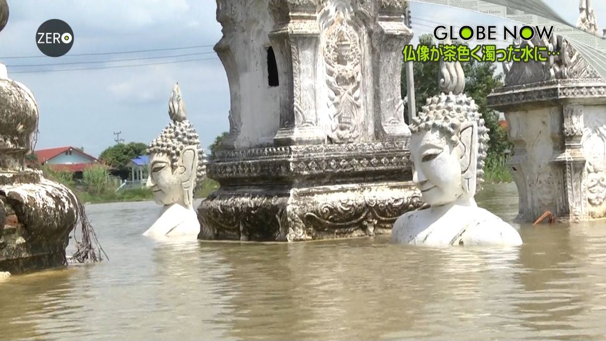 タイで洪水、川が氾濫…仏像が胸まで浸水